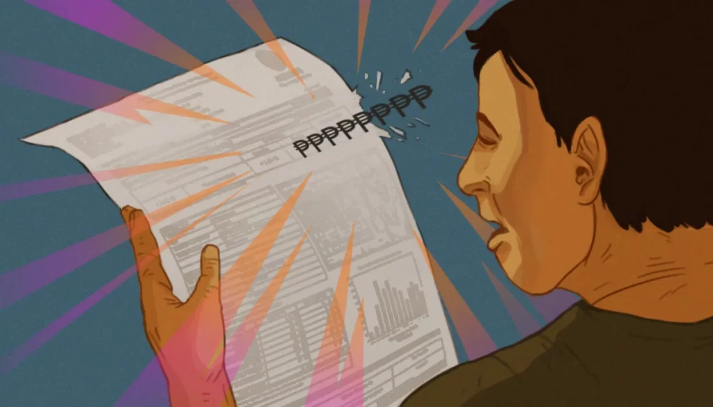 a man holding an electricity bill